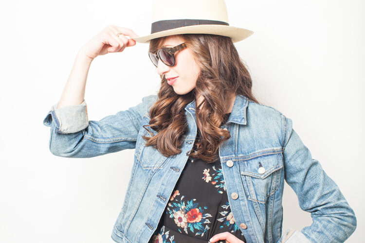 Style Bee in a floral dress and denim jacket.